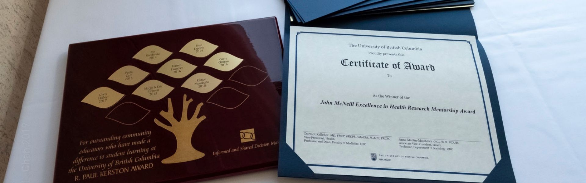 Photo of plaque and certificate