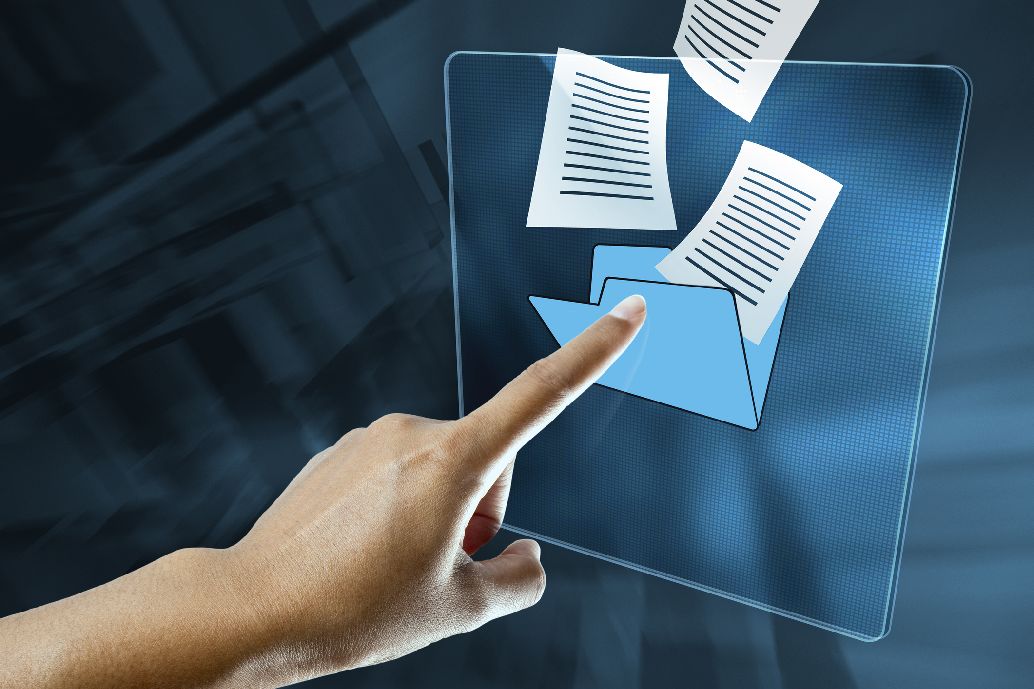 Photo of finger posting at documents coming out of a folder