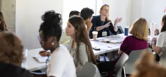 Participants in conversation at Bridging Research & Action