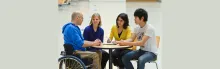 Photo of students having a conversation with their health mentor