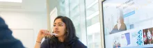 Photo of student in research meeting