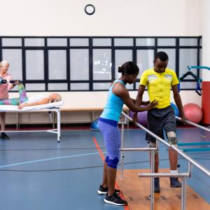 Photo of patients getting physical therapy treatment at clinic