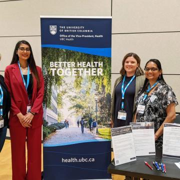 Photo of Priyanka Chahal and UBC Health staff at TUFH conference